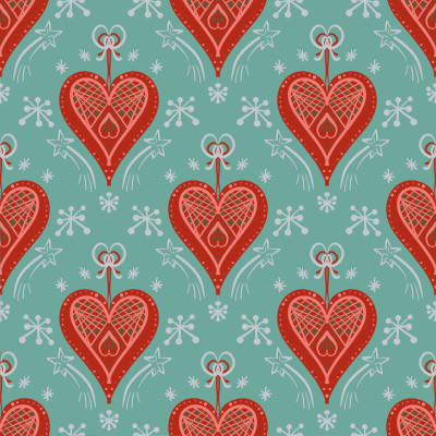 Red hearts Christmas ornaments on mint green